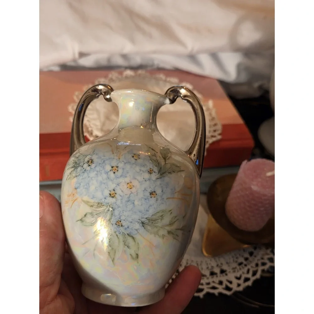 Vintage hand-painted porcelain or ceramic bud vase featuring an iridescent,...